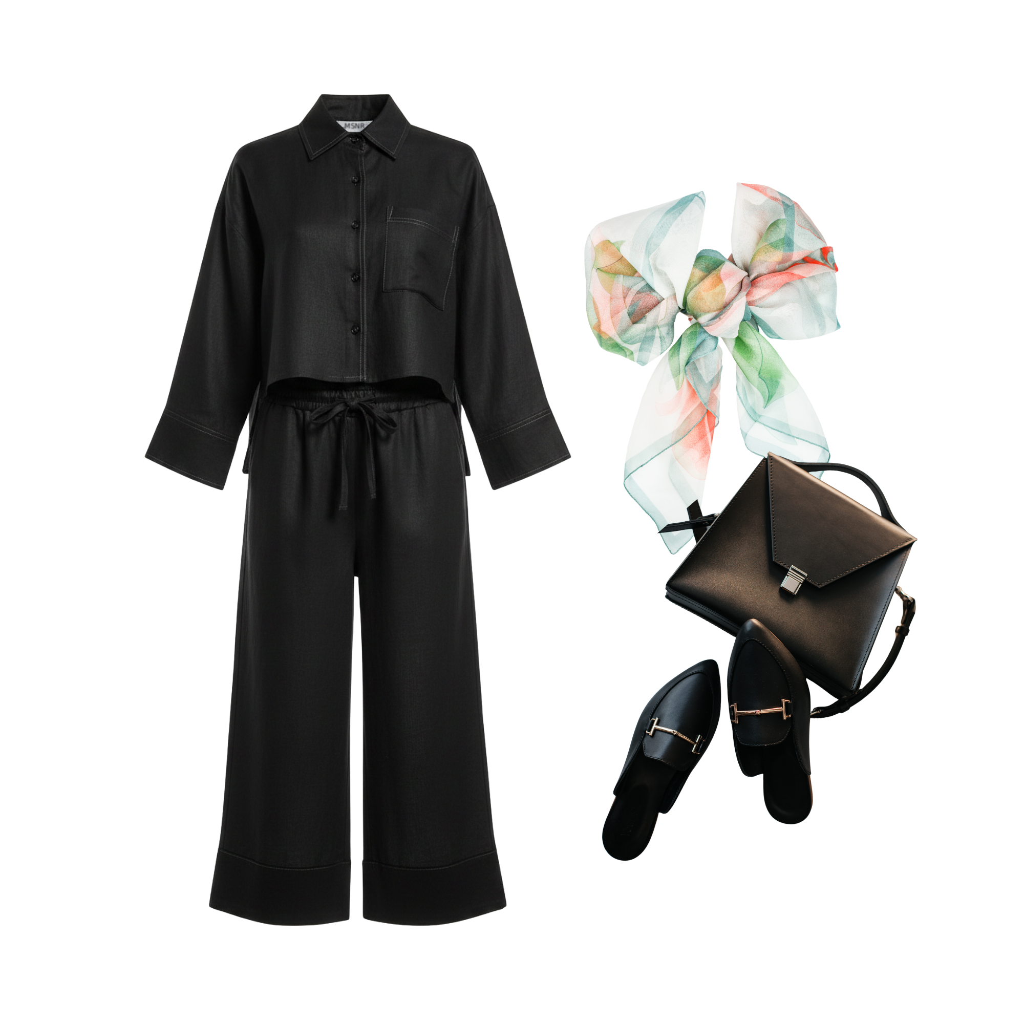 Black outfit with wide-leg pants, floral bow, and brown bag on a white background
