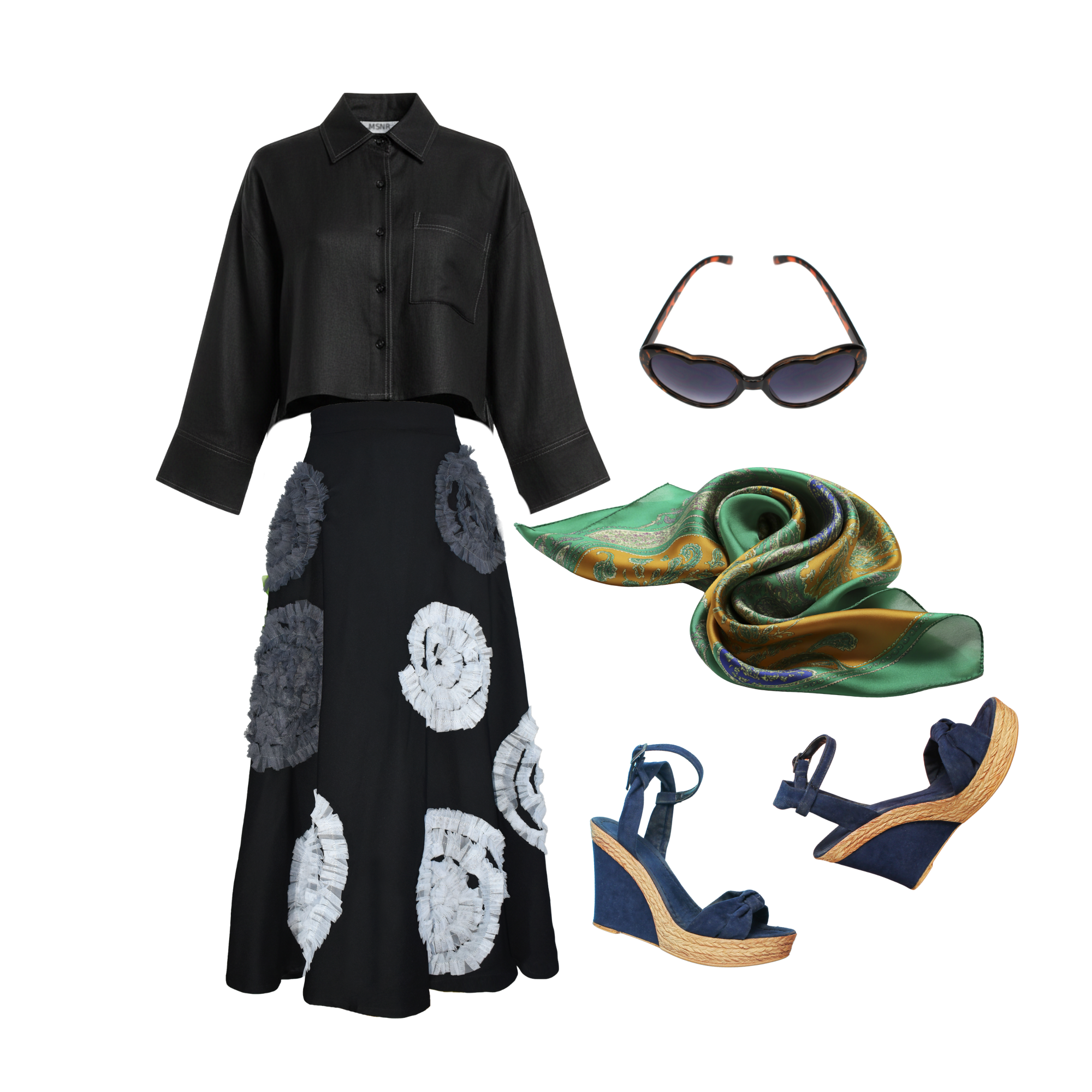 Black outfit with floral skirt, black shirt, green scarf, sunglasses, and wedge sandals on a white background