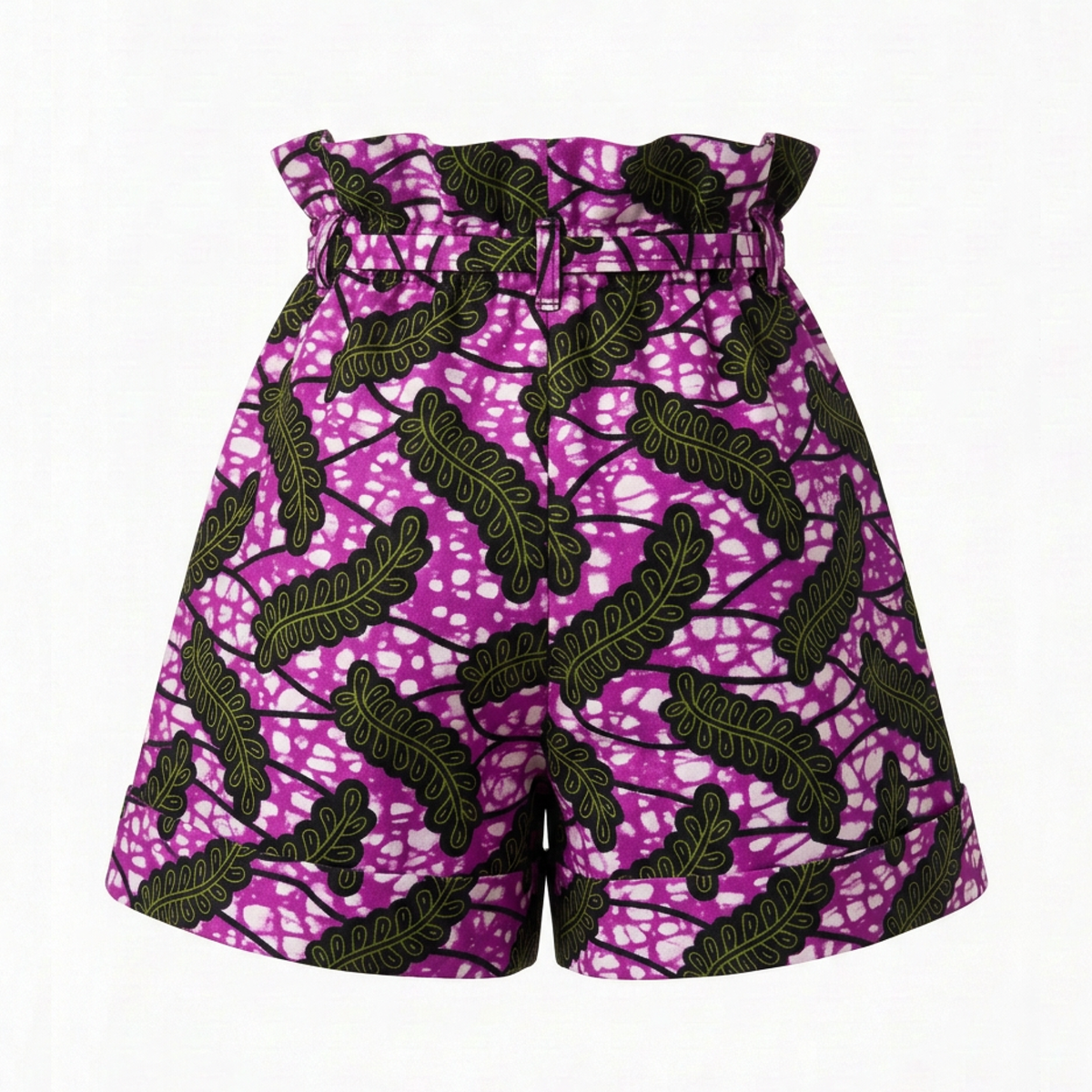 A pair of high-waisted shorts featuring a vibrant magenta and white African wax print pattern with black leaf motifs, displayed against a clean white background.