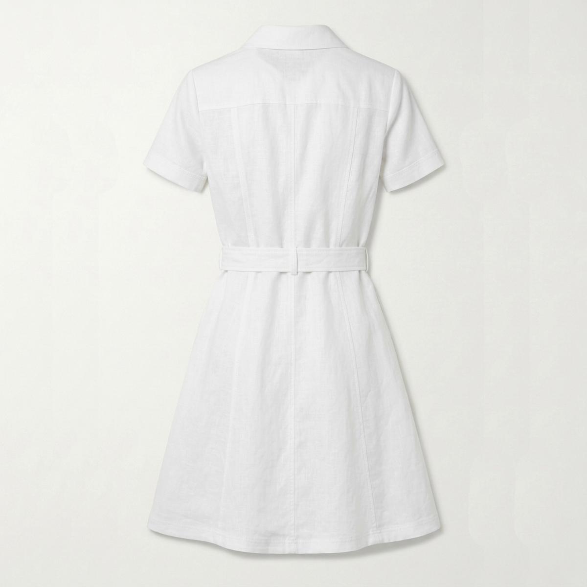 A white short-sleeve collared dress shown from the back, featuring a self-tie belt at the waist and a flared skirt, photographed against a light off-white background.