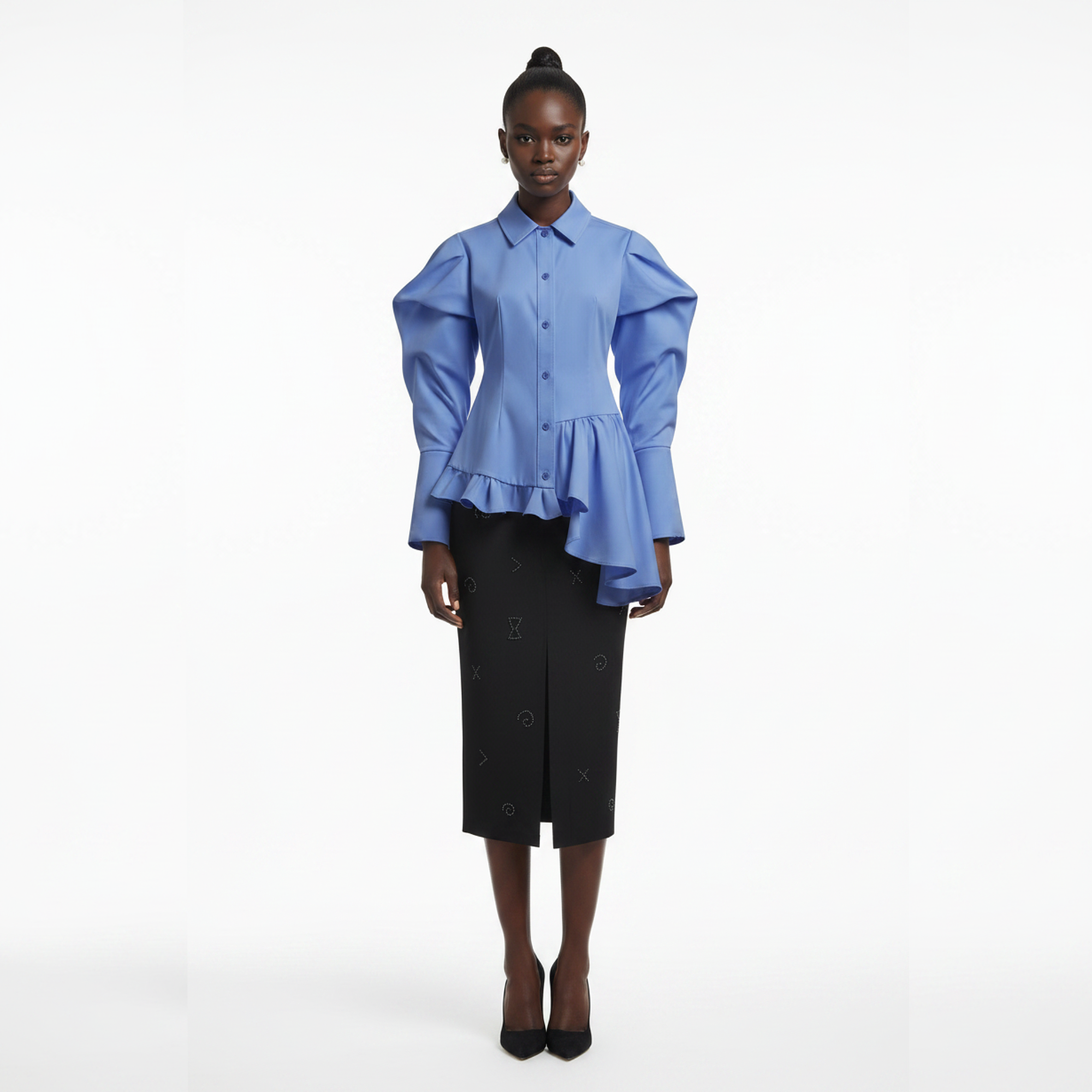 Woman wearing a blue peplum blouse and black skirt on a white background