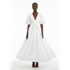 Woman wearing a white dress on a white background