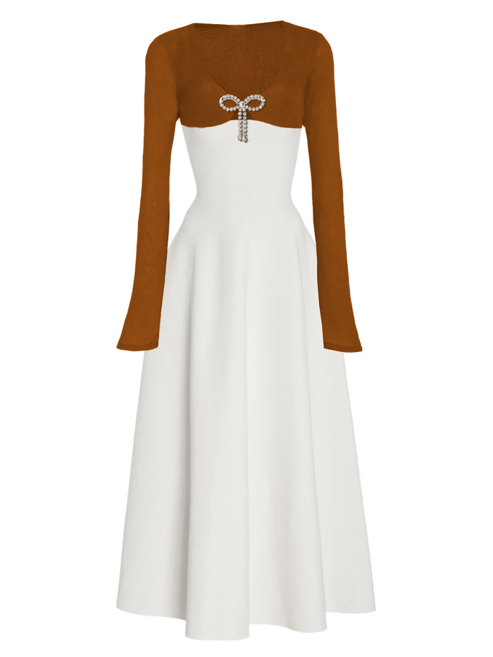 White dress with brown long-sleeve top on a white background