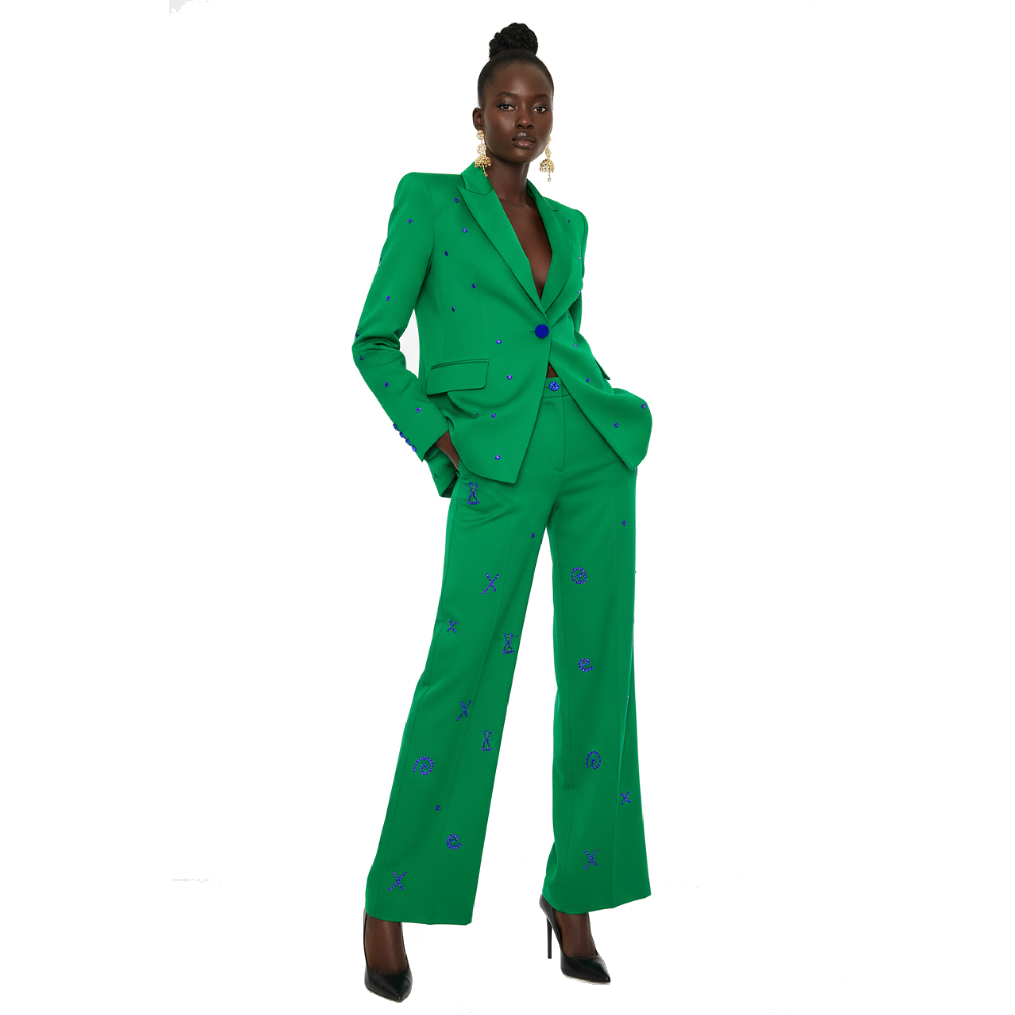 Person wearing a green suit with blue accents on a white background