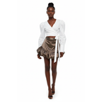 Woman wearing a white wrap top and brown skirt on a white background