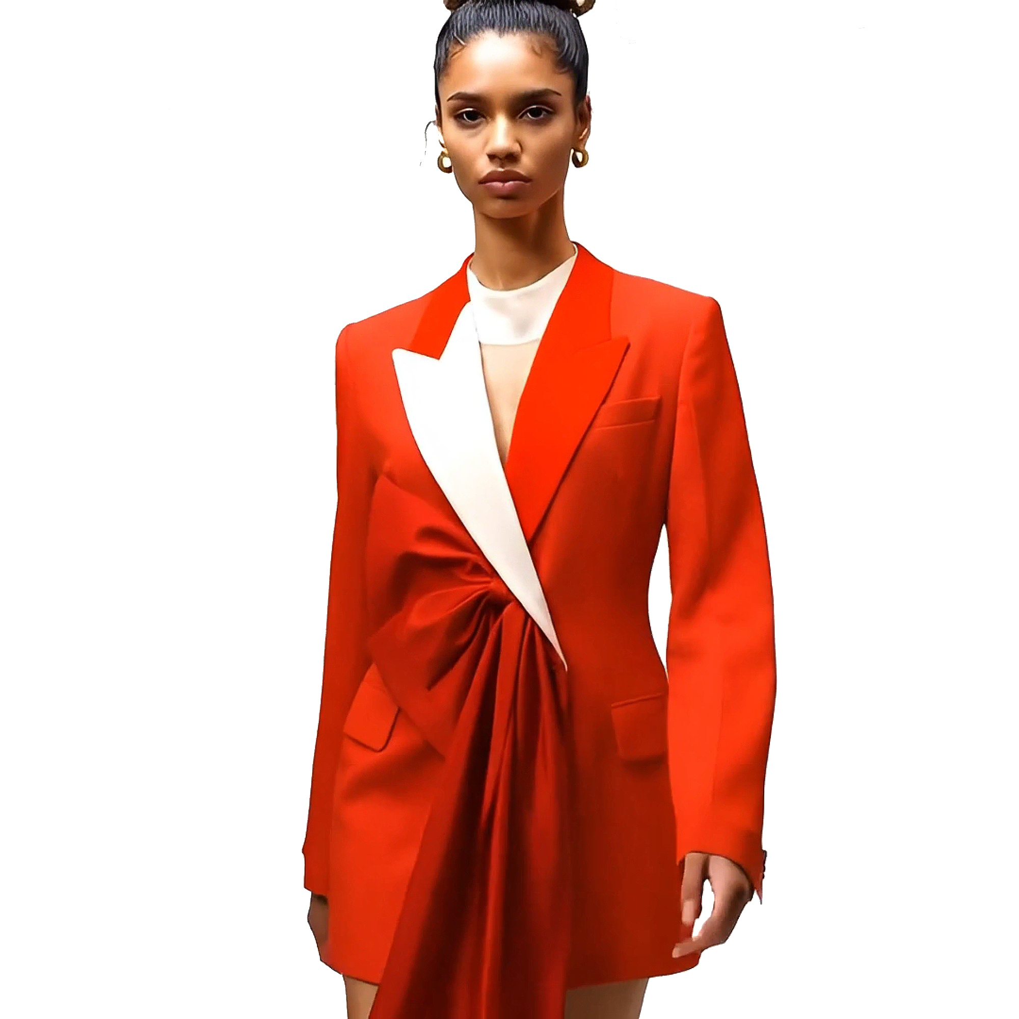 Woman wearing a bright red blazer with a white shirt underneath on a white background