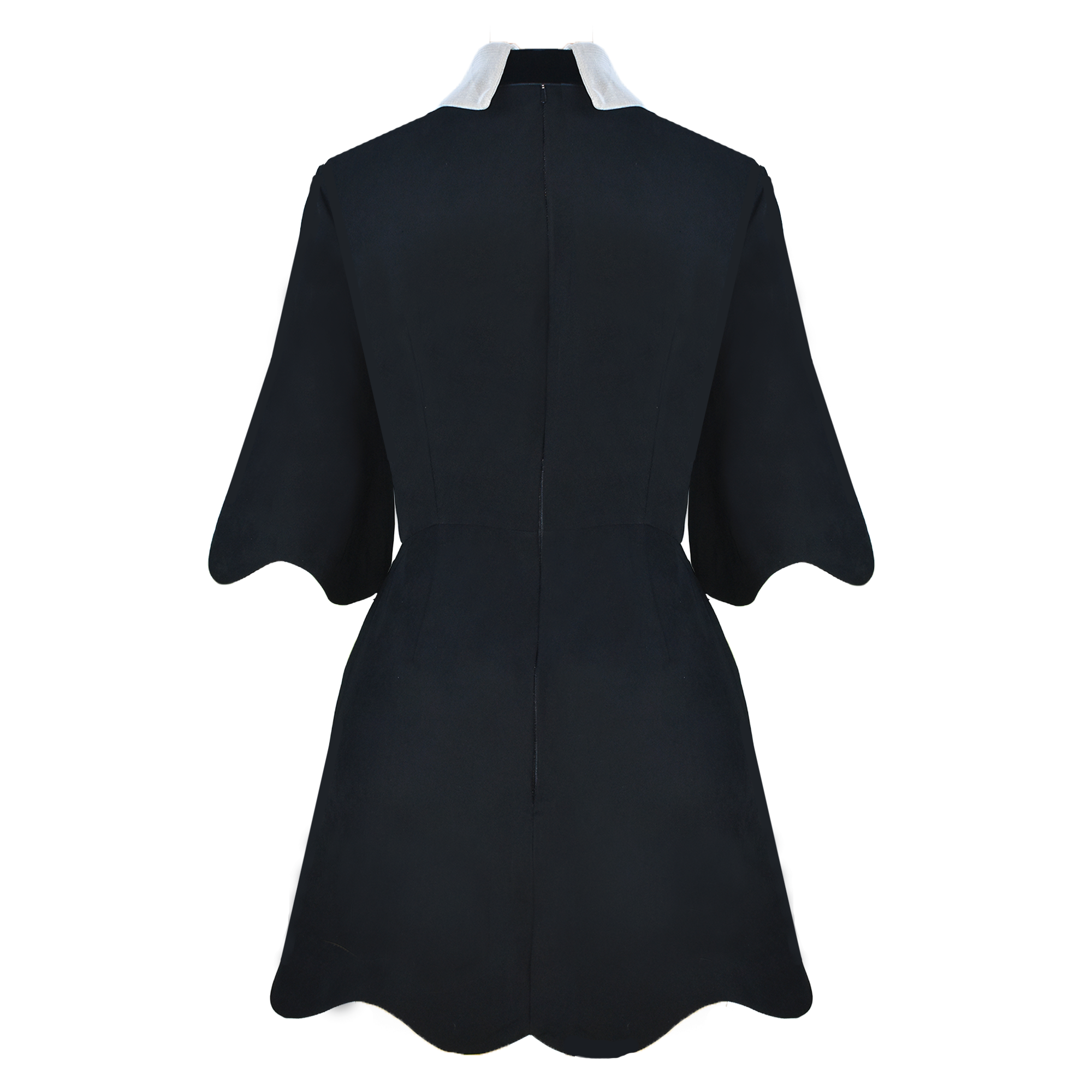 Black dress with white trim on a white background