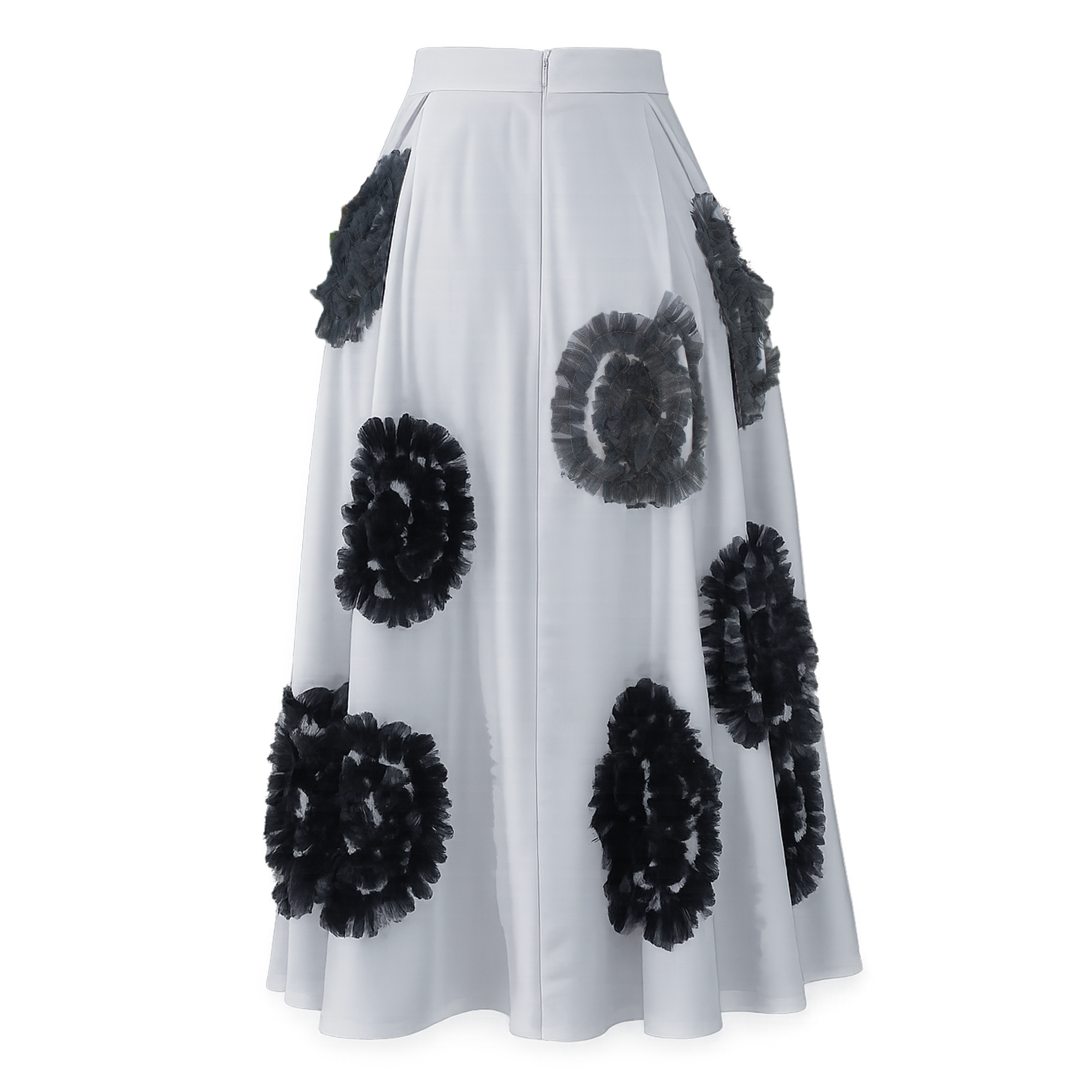 White skirt with black floral patterns on a white background
