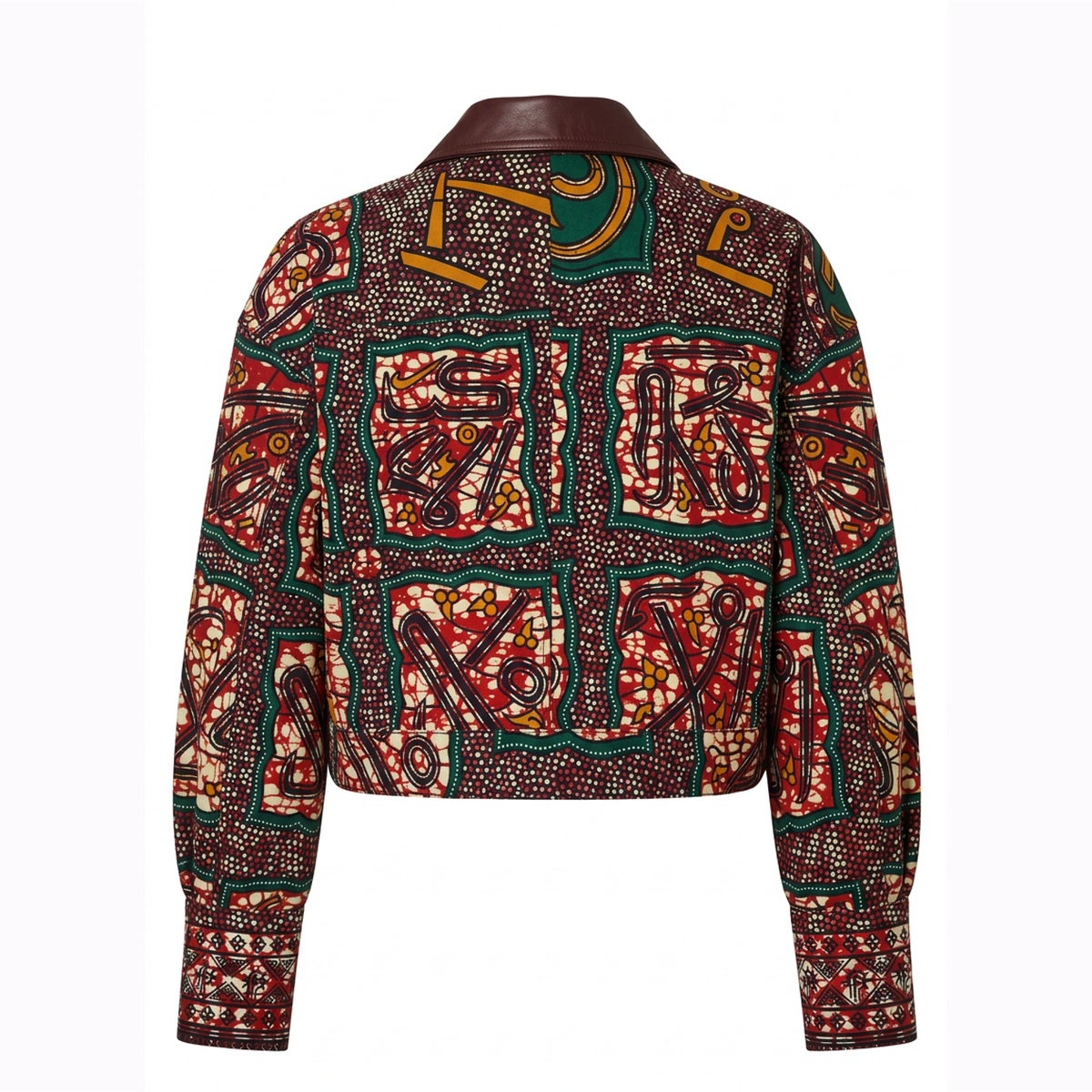 A cropped long-sleeve jacket shown from the back, featuring an intricate, colorful African wax print pattern with red, green, yellow, and brown geometric and abstract motifs on a white background.