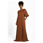 Woman wearing a brown dress on a white background