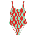 Red and green wavy patterned swimsuit on a white background