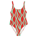 Red and green wavy patterned swimsuit on a white background