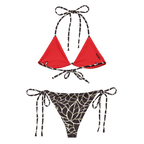 Red bikini top and black and white patterned bottom on a white background