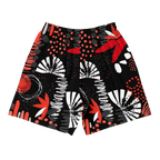 Shorts with a red, black, and white abstract pattern on a white background