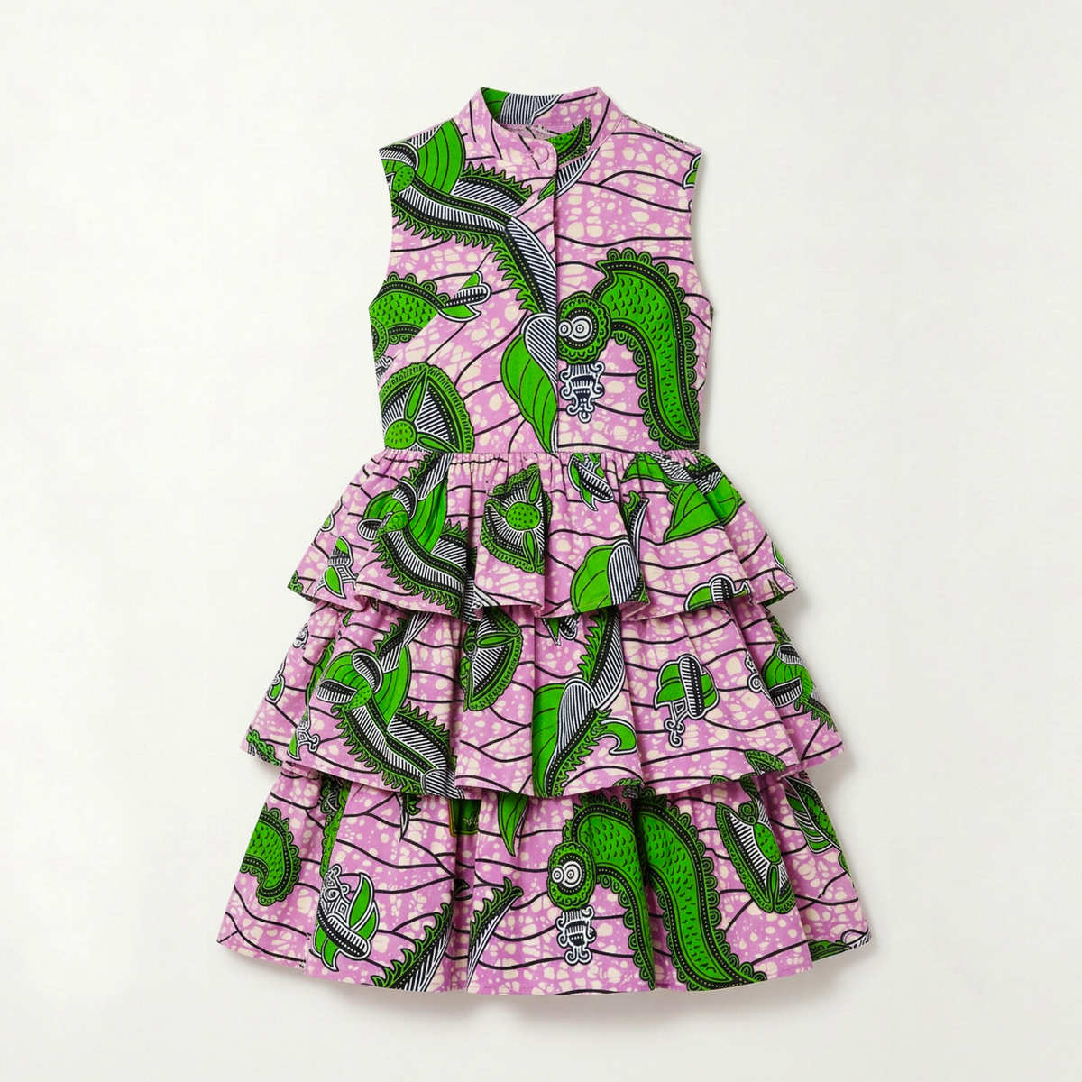 A sleeveless tiered dress with a pink and green patterned African wax print, featuring a high collar and a ruffled skirt, laid flat on a white background.