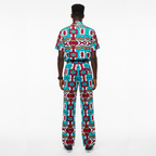 Person wearing a colorful patterned outfit on a white background
