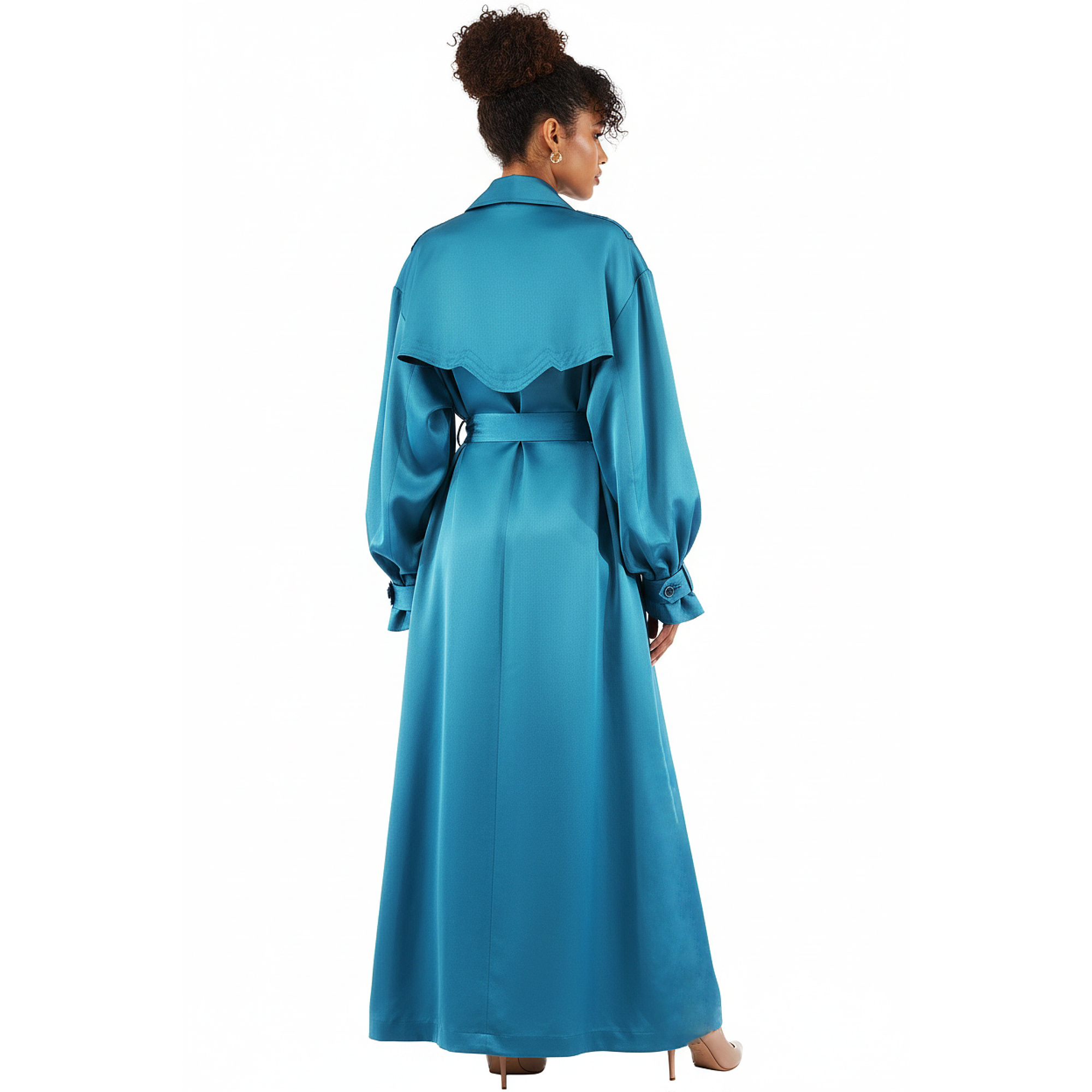 Woman wearing a blue dress with a belt on a white background
