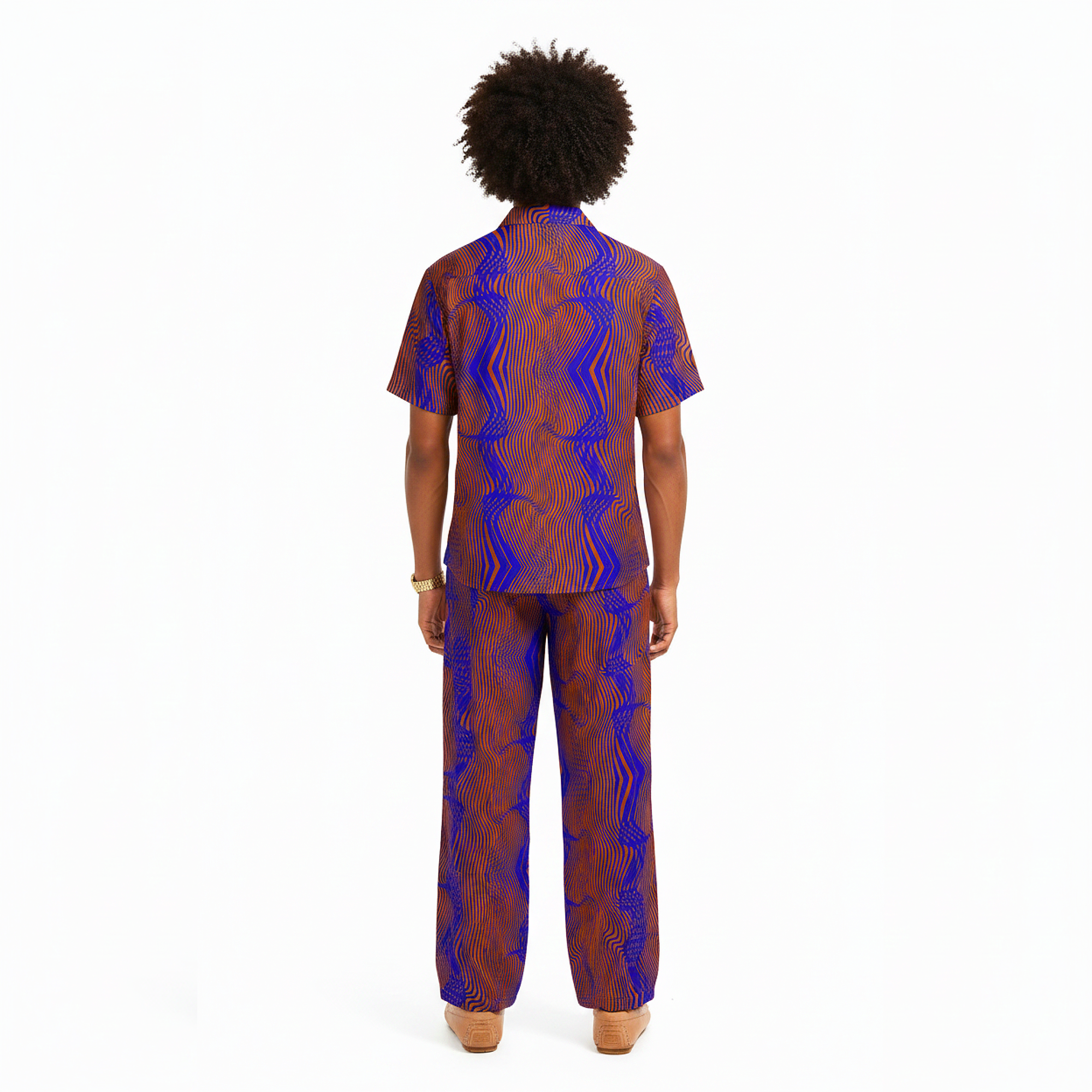 Person wearing a patterned outfit on a white background