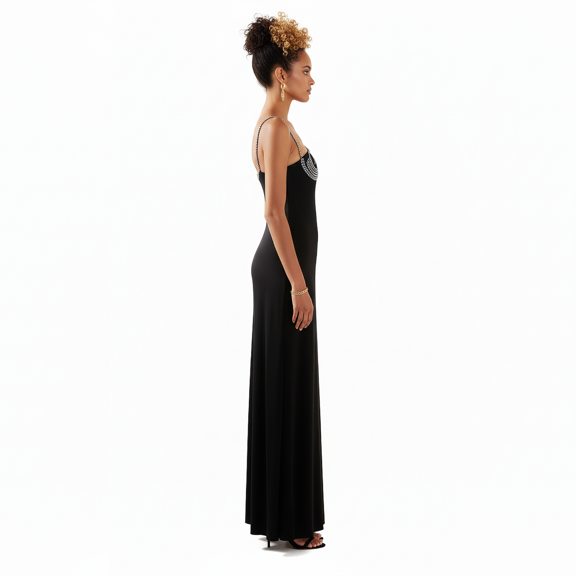 Woman wearing a black evening gown on a white background