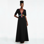 Black dress with colorful butterfly design on a white background