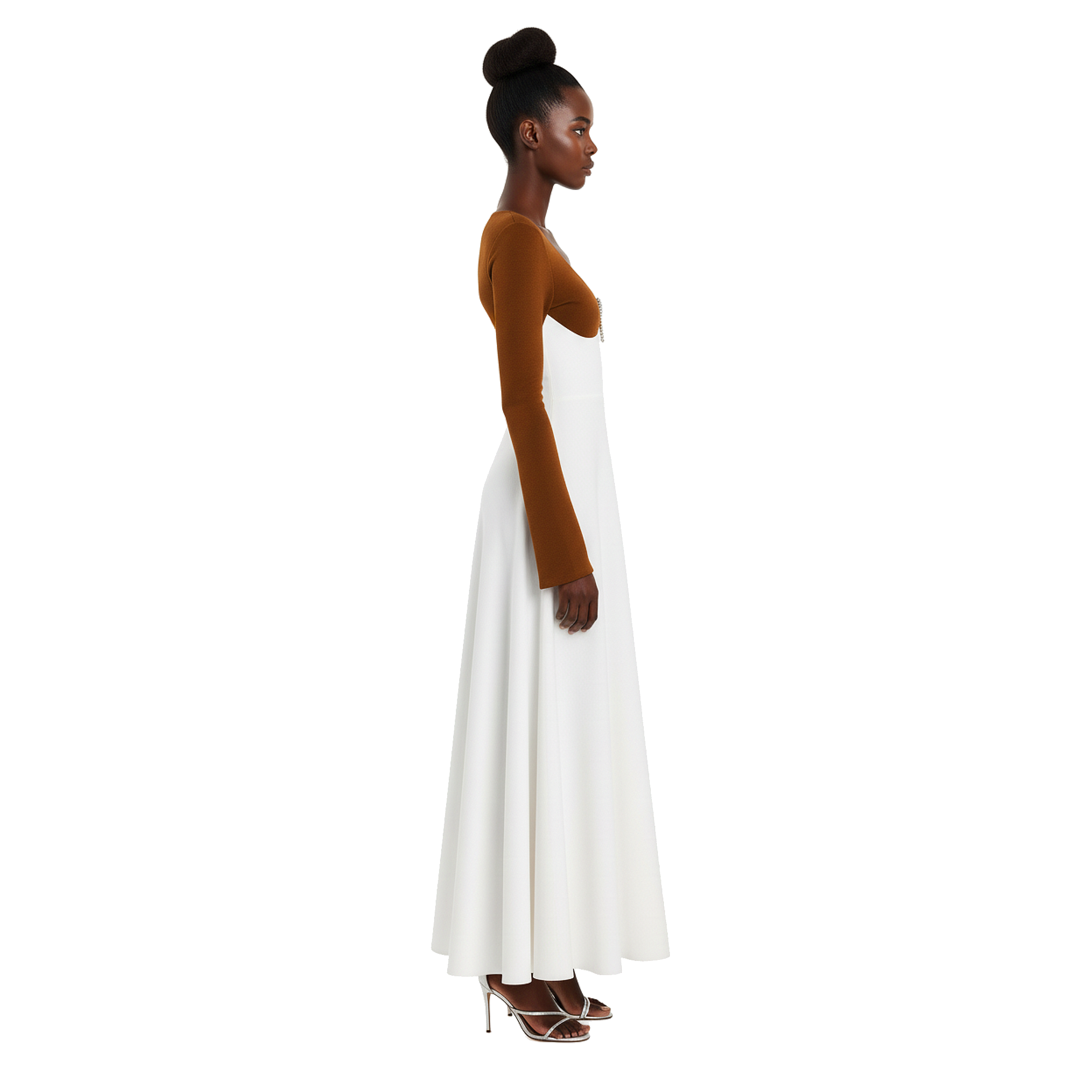 Woman wearing a long, white dress with brown sleeves on a white background