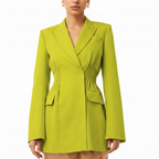 Green blazer worn by a model on a white background