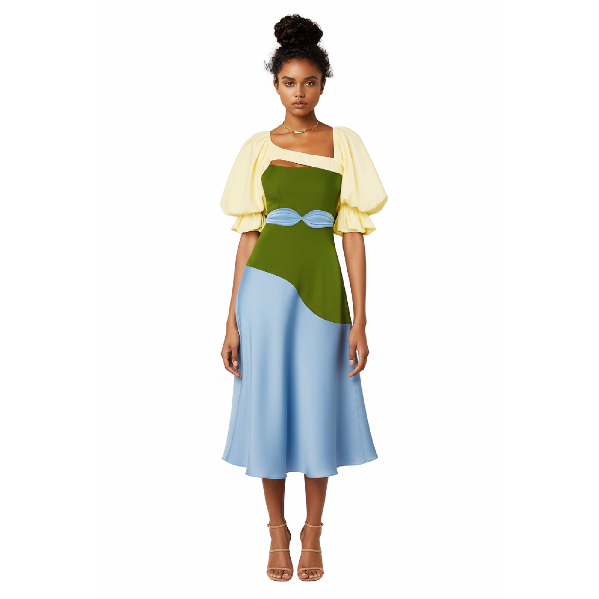 Woman wearing a dress with a green bodice and light blue skirt on a white background