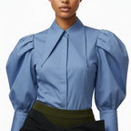 Blue blouse with puffed sleeves worn by a model on a white background