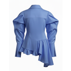 Blue blouse with ruffled details on a white background
