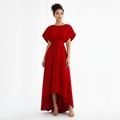 Woman wearing a red dress on a white background
