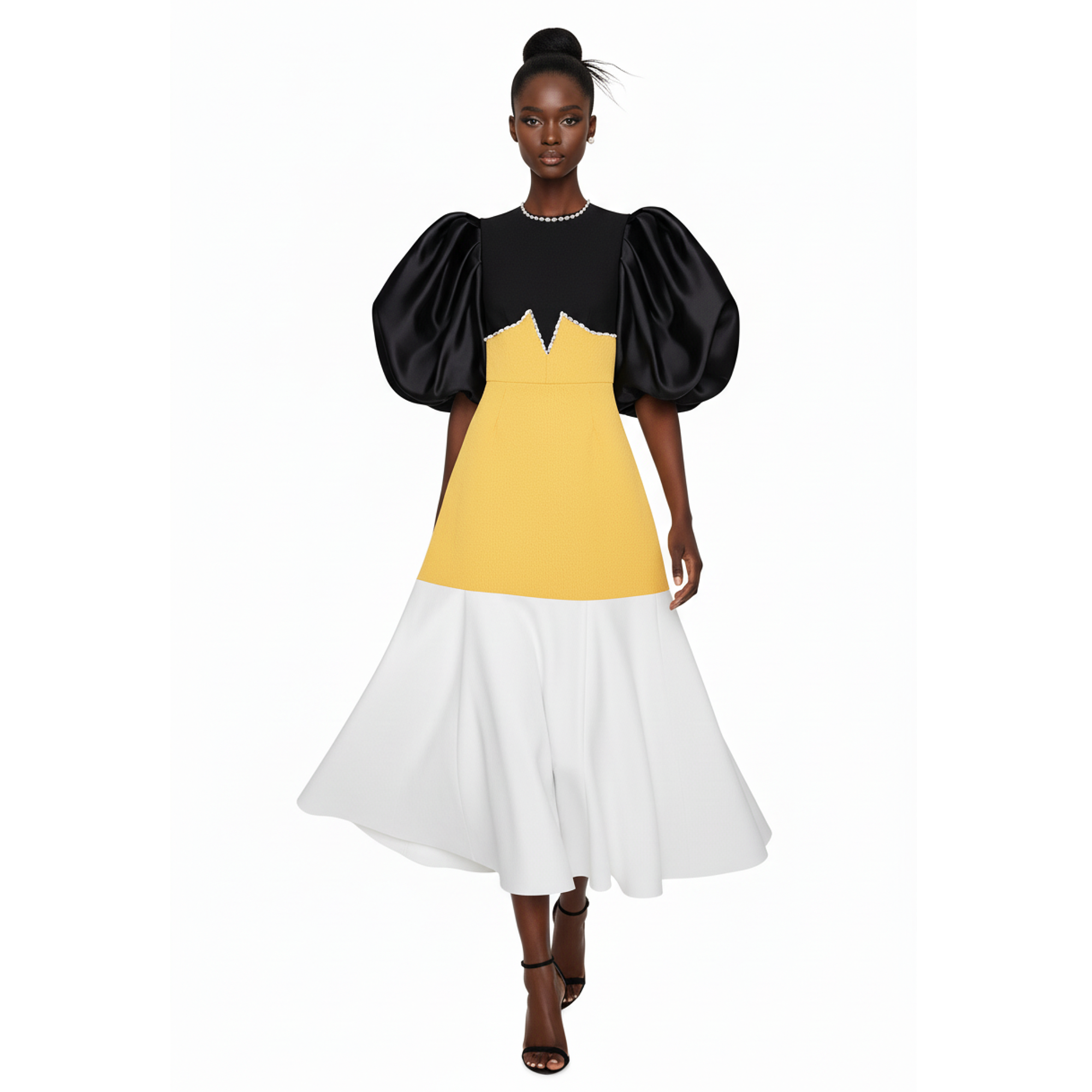 Woman wearing a dress with black, yellow, and white color block design on a white background