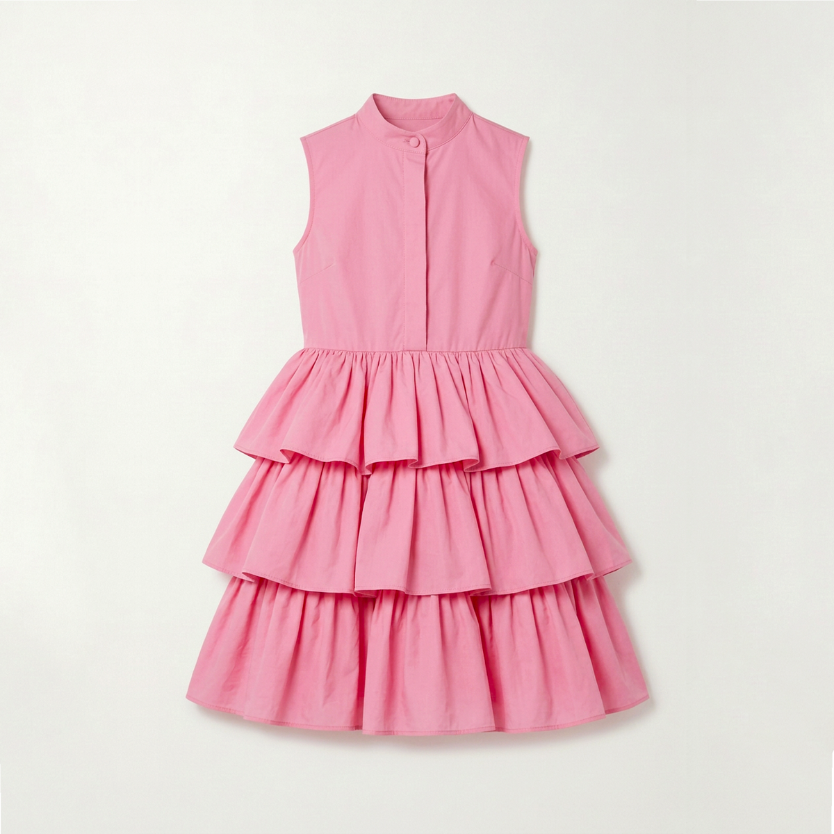A sleeveless pink dress with a high mock neck, button front, and a tiered ruffle skirt, laid flat against a light off-white background.