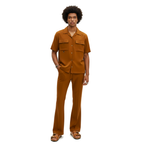 Man wearing a brown outfit on a white background