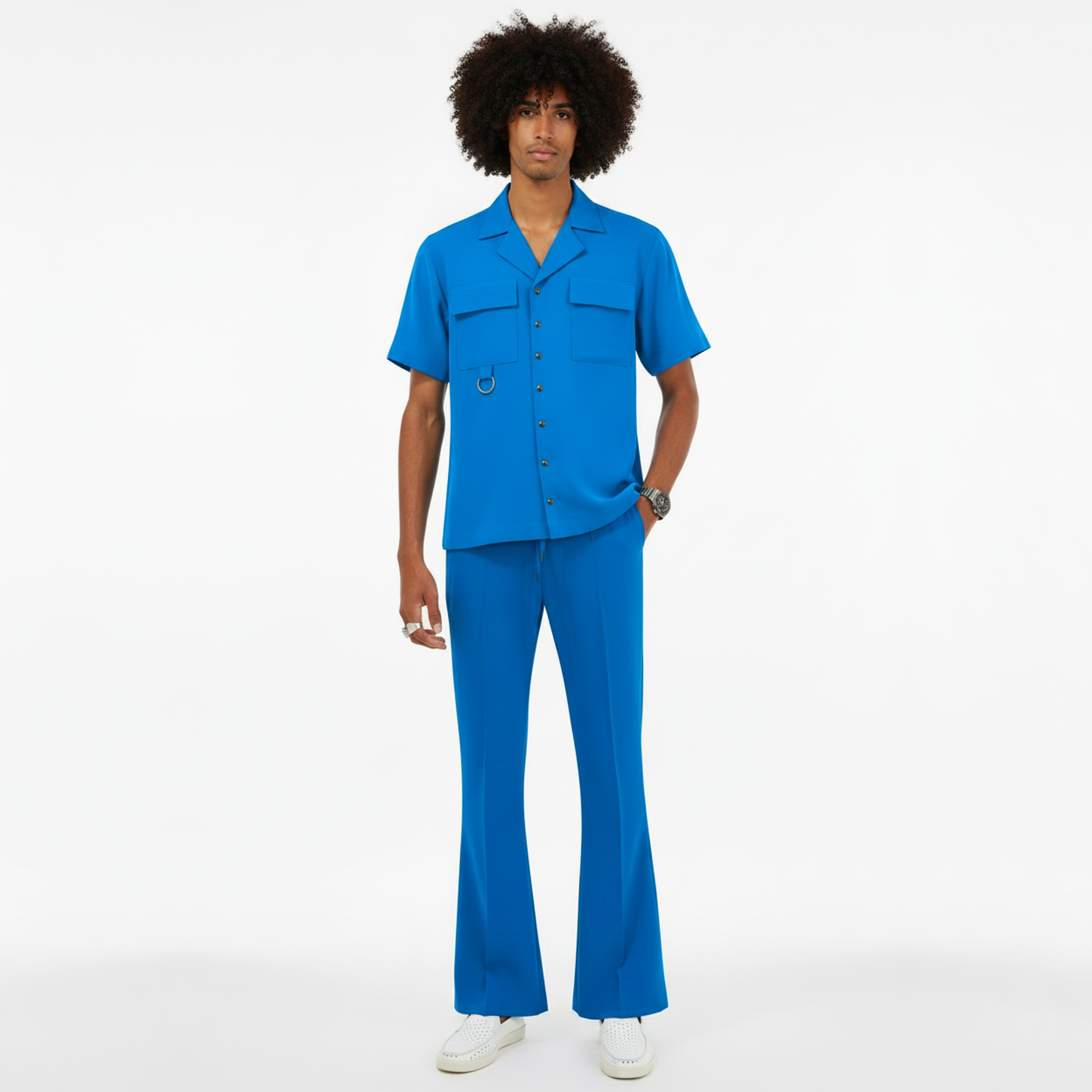 Person wearing a blue outfit on a white background