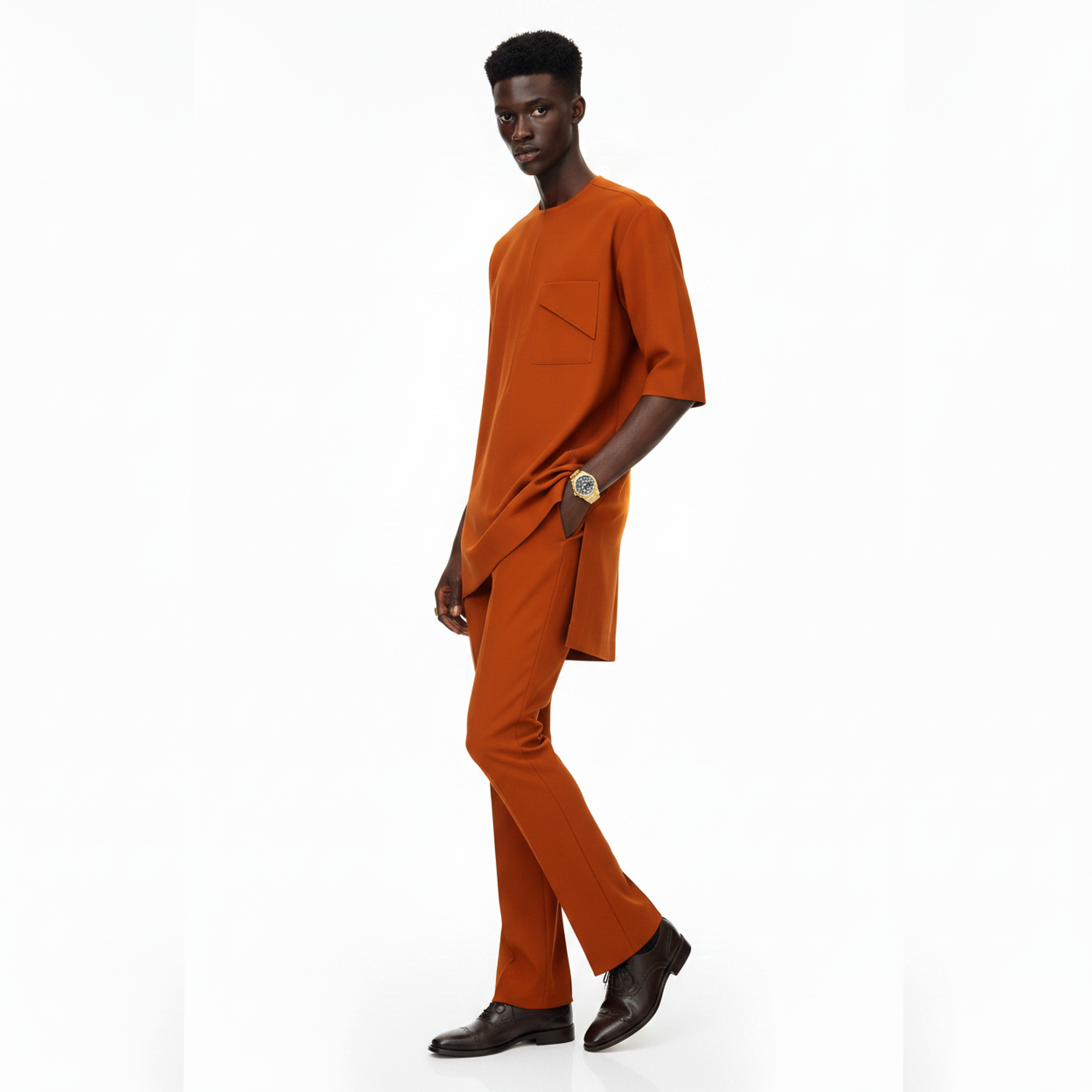 Man wearing an orange outfit on a white background