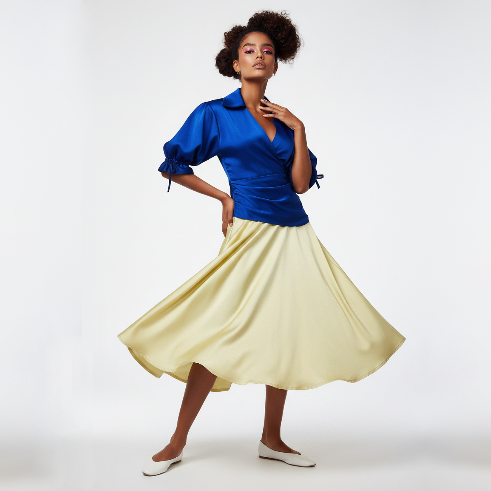 Woman wearing a dress with a blue top and yellow skirt on a white background