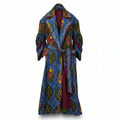 A long open-front robe with a blue base and an all-over multicolor batik-style leaf and circular pattern, shown against a plain white background.
