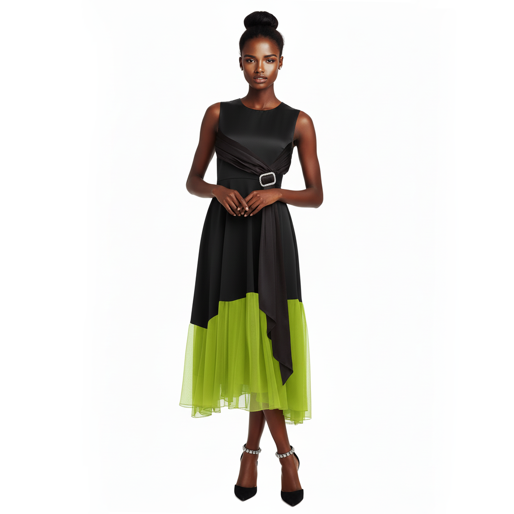 Woman wearing a black and green dress on a white background