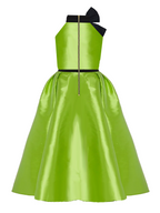 Green dress with black accents on a white background