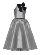 Silver dress with a black bow on a white background