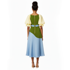 Woman wearing a green and blue dress with a white background
