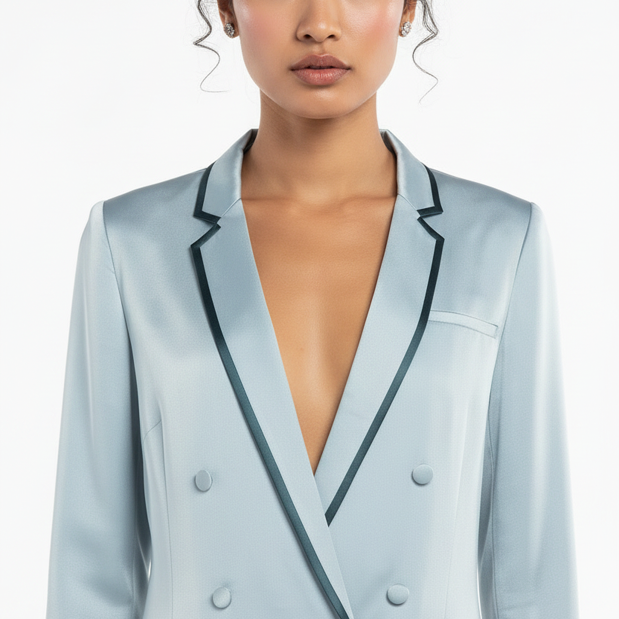 Light blue blazer with black trim worn by a model on a white background