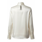 White blouse with a high collar on a white background