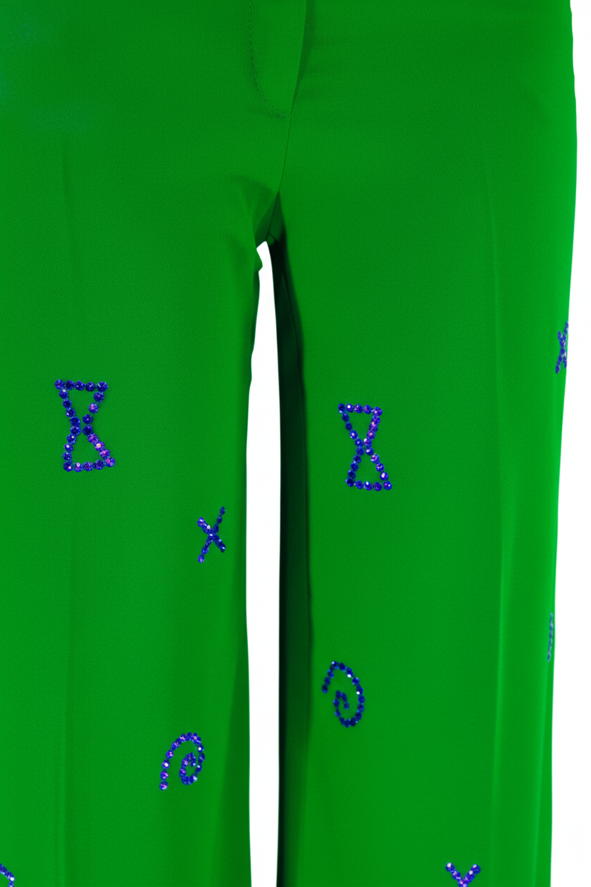 Green pants with blue geometric patterns on a white background