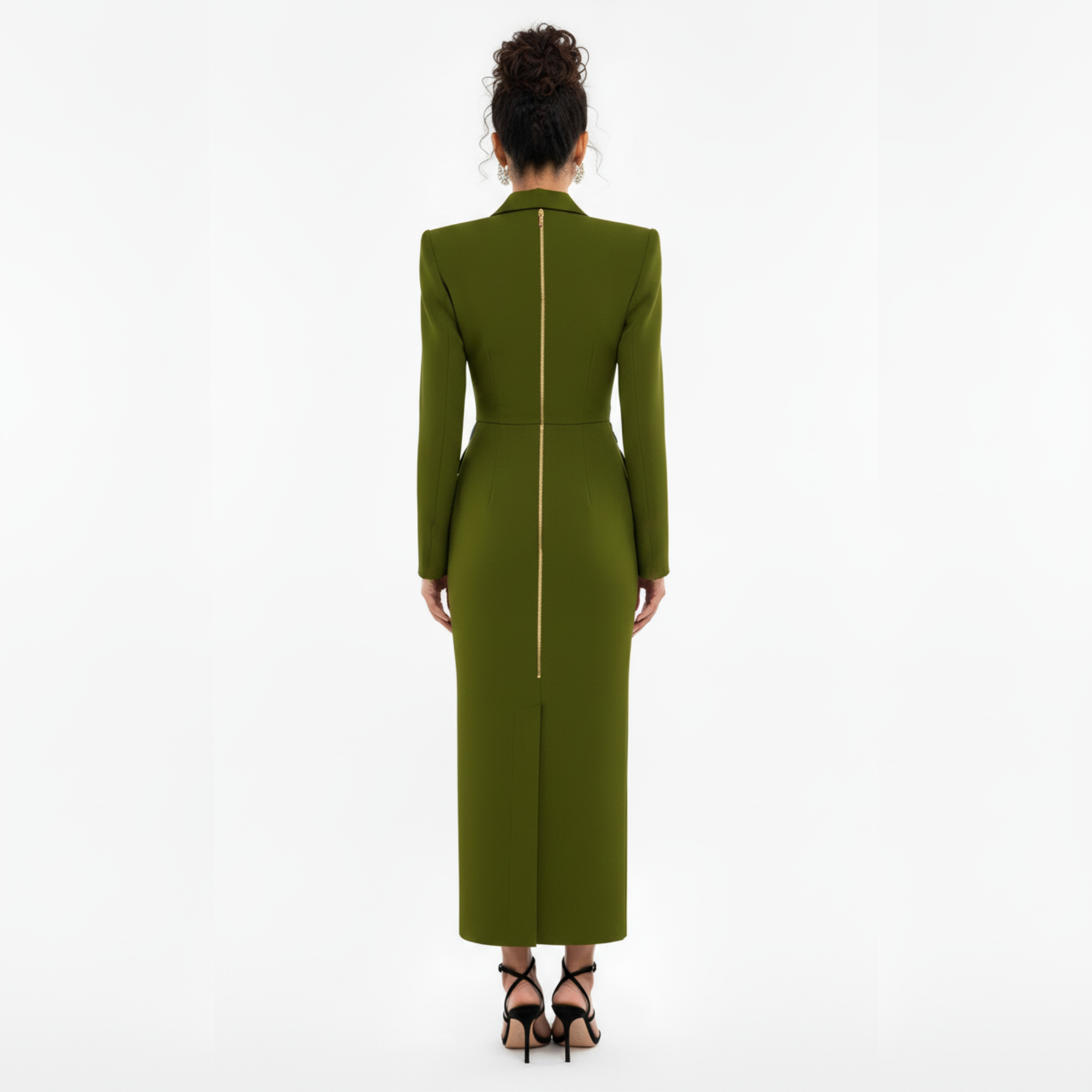 Green dress with a gold zipper on a white background