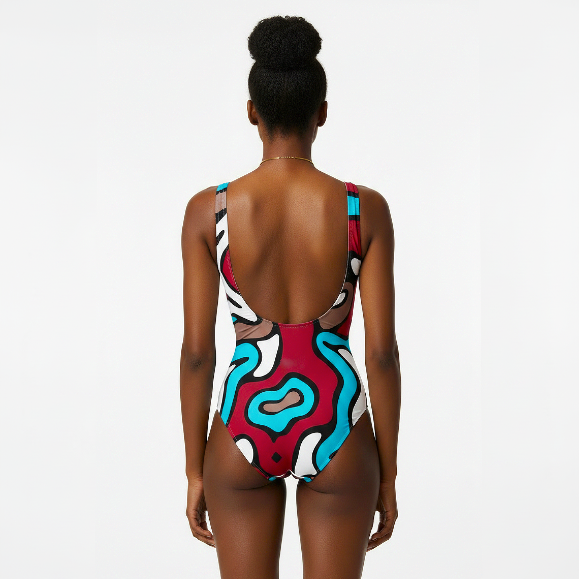 Colorful swimsuit with abstract design on a plain background