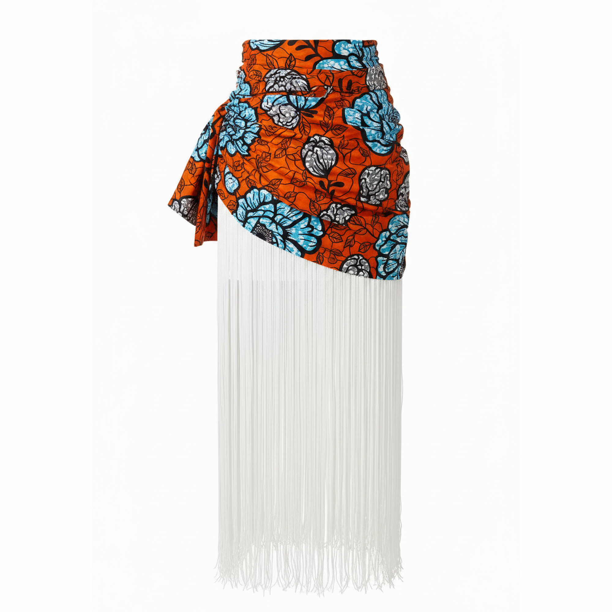 A high-waisted asymmetrical wrap skirt featuring a vibrant orange, blue, and black African wax print fabric on the top half, with a long white fringe cascading down the bottom half, shown against a plain white background.