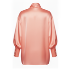Pink satin shirt on a white background