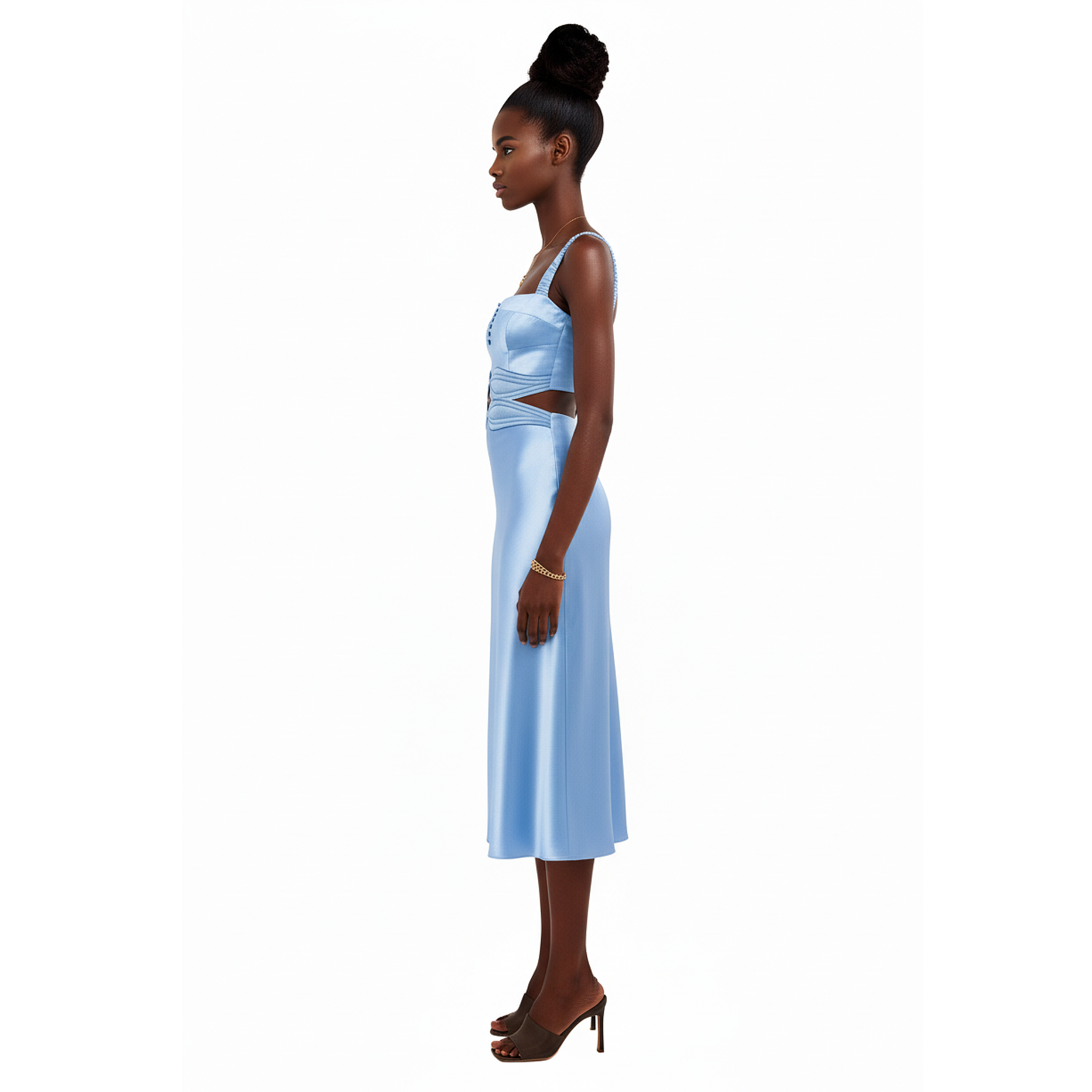 Woman wearing a light blue evening gown on a white background