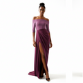 Woman wearing a purple off-shoulder gown with a slit on a white background